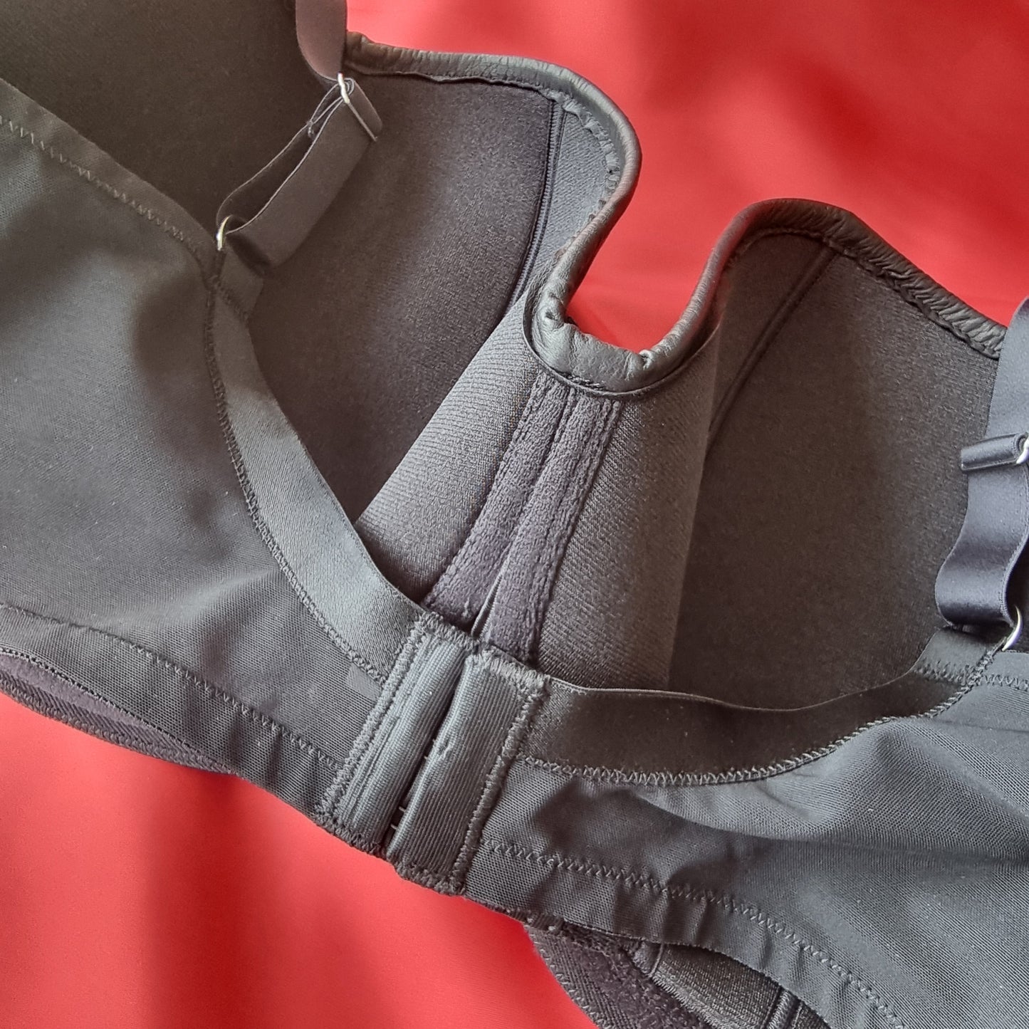 Leather balcony bra D-HH with curved top edge, wider straps