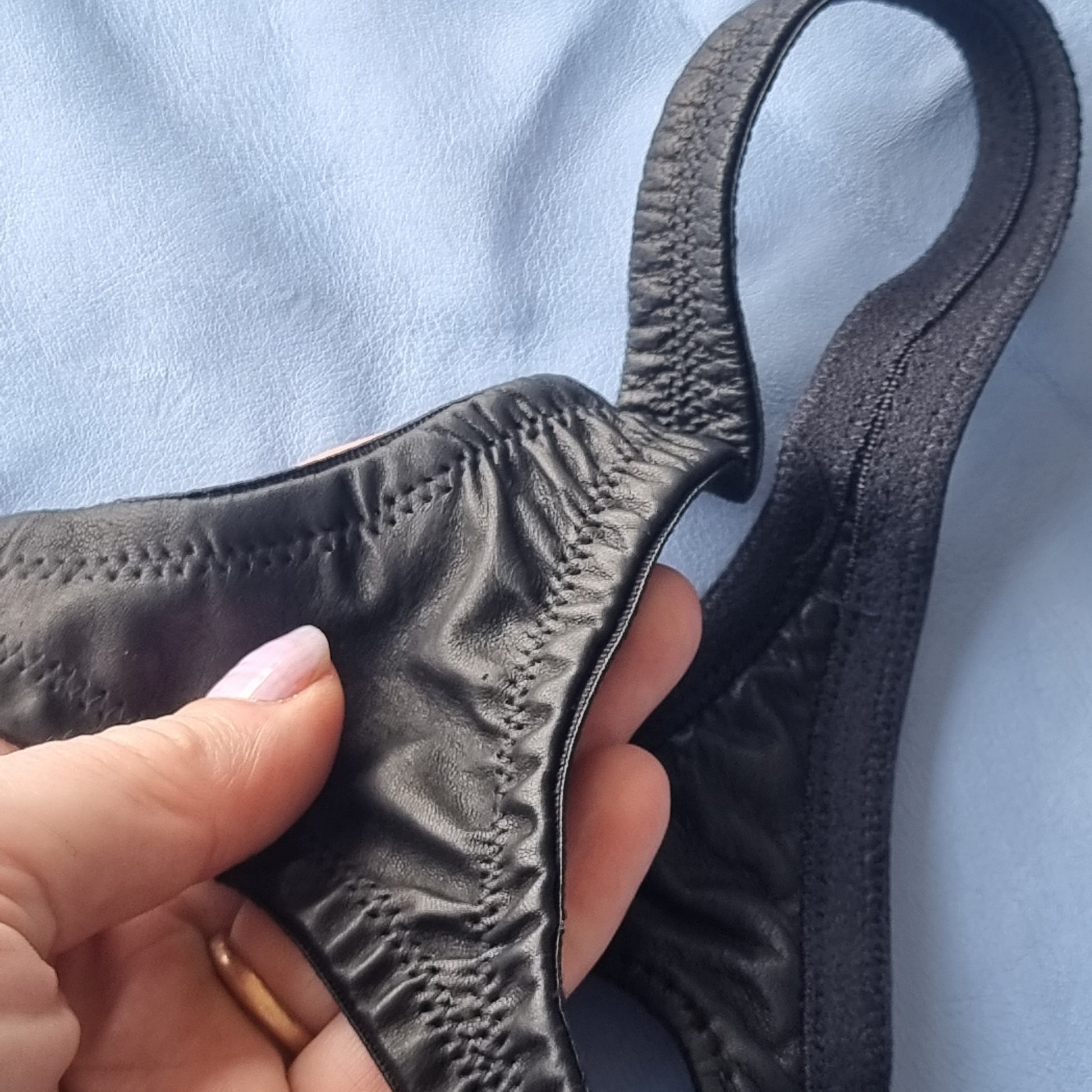 Lux Tenebrae black leather cock ring thong for men with choice of ring sizes, handmade in sizes 30-40. Gorgeous washable glove leather thong with integral steel cockring