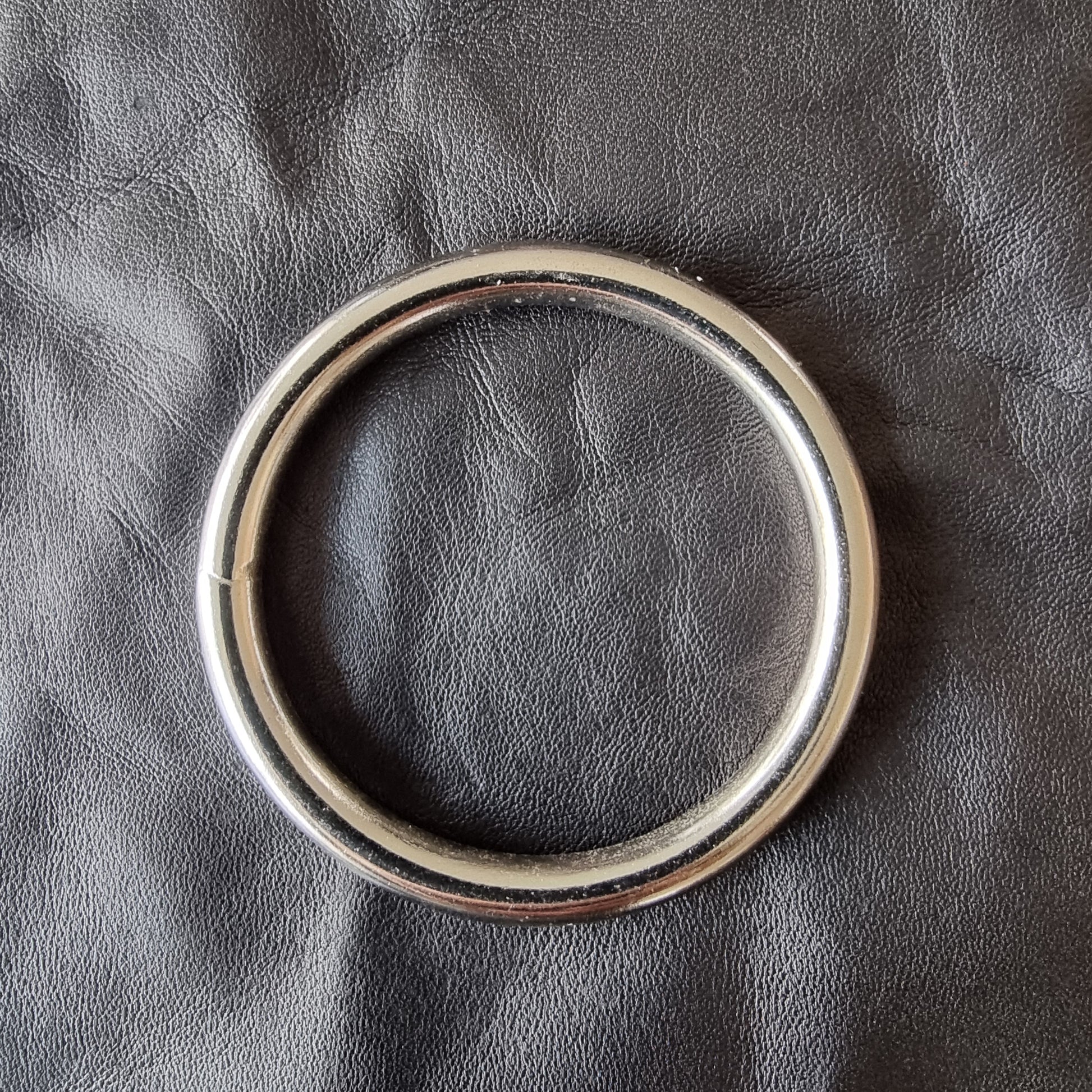 Lux Tenebrae black leather cock ring thong for men with choice of ring sizes, handmade in sizes 30-40. Gorgeous washable glove leather thong with integral steel cockring