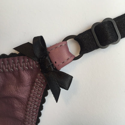 Leather Kiss Kiss G-string briefs for women in black, with bow accents