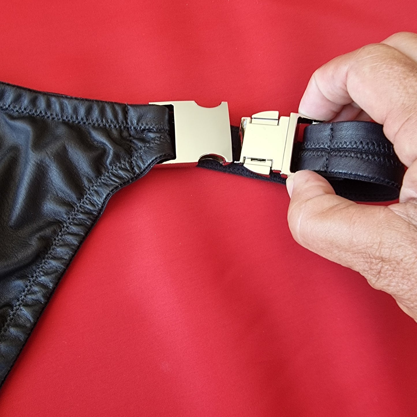 Leather stripper thong for men in black, washable glove leather with quick-release buckles

