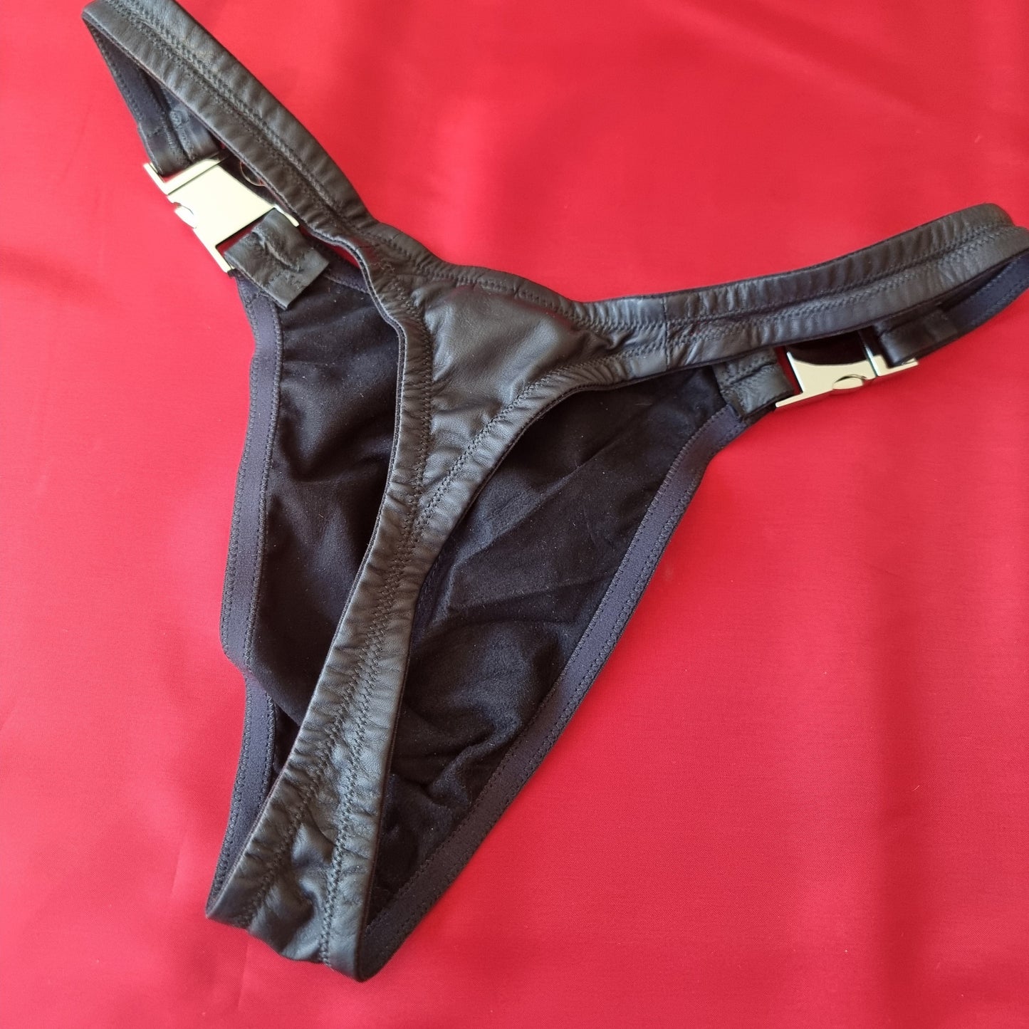Leather stripper thong for men in black, washable glove leather with quick-release buckles