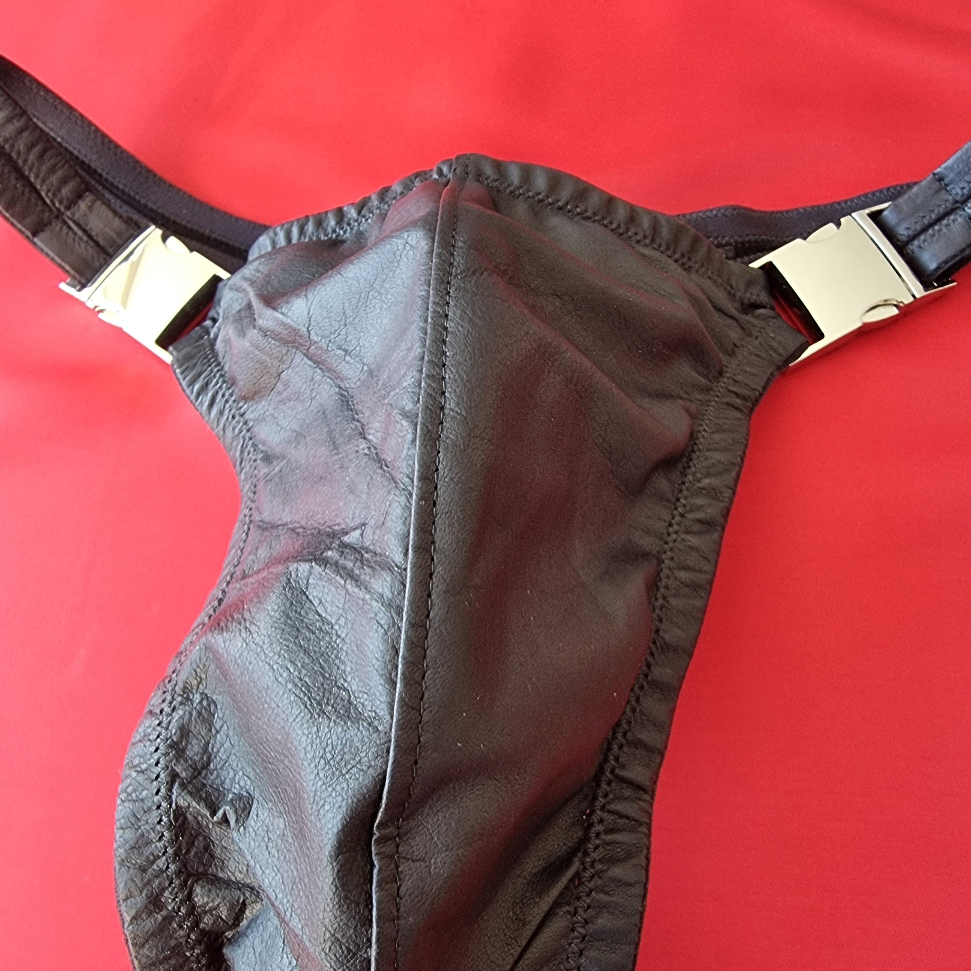 Leather stripper thong for men in black, washable glove leather with quick-release buckles