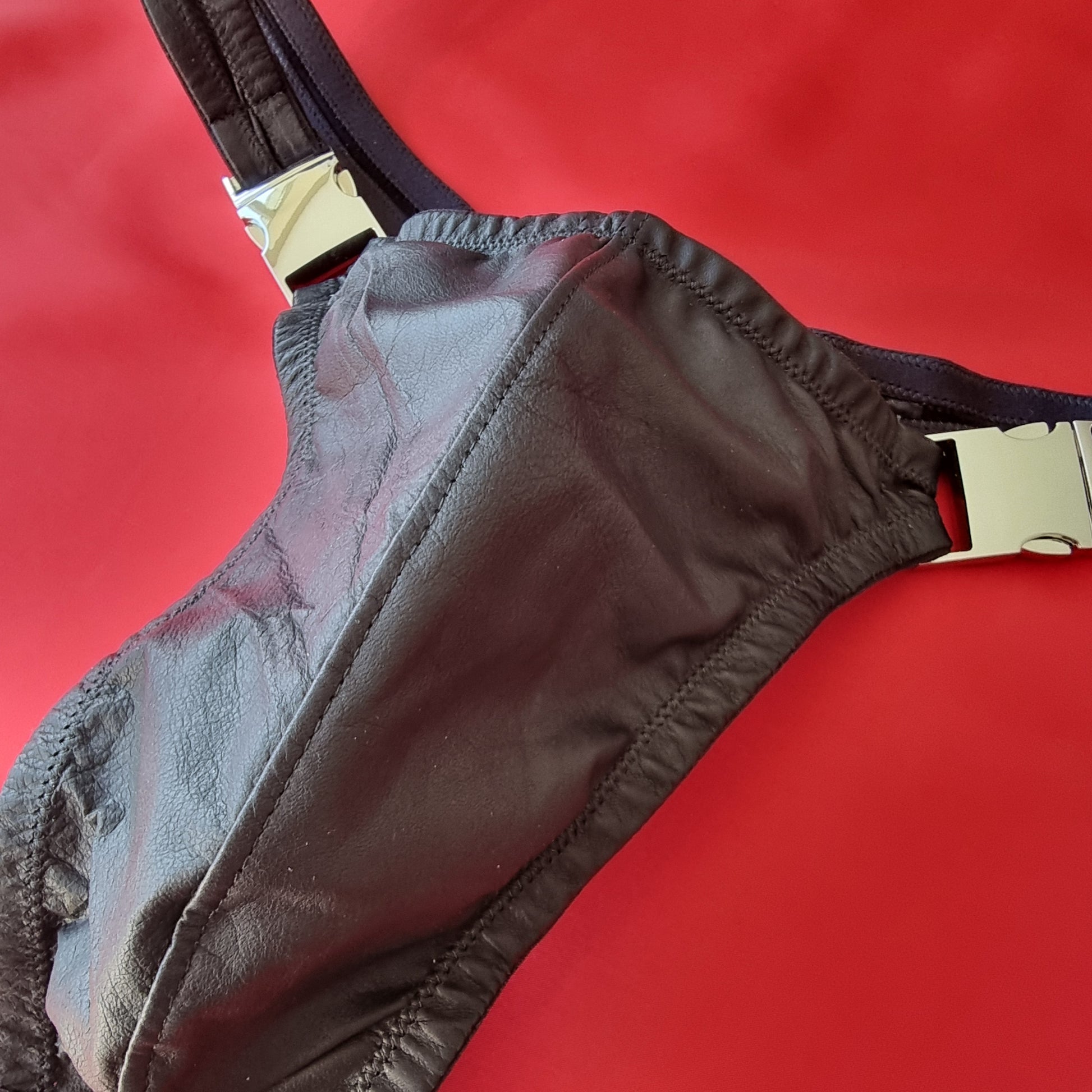 Leather stripper thong for men in black, washable glove leather with quick-release buckles
