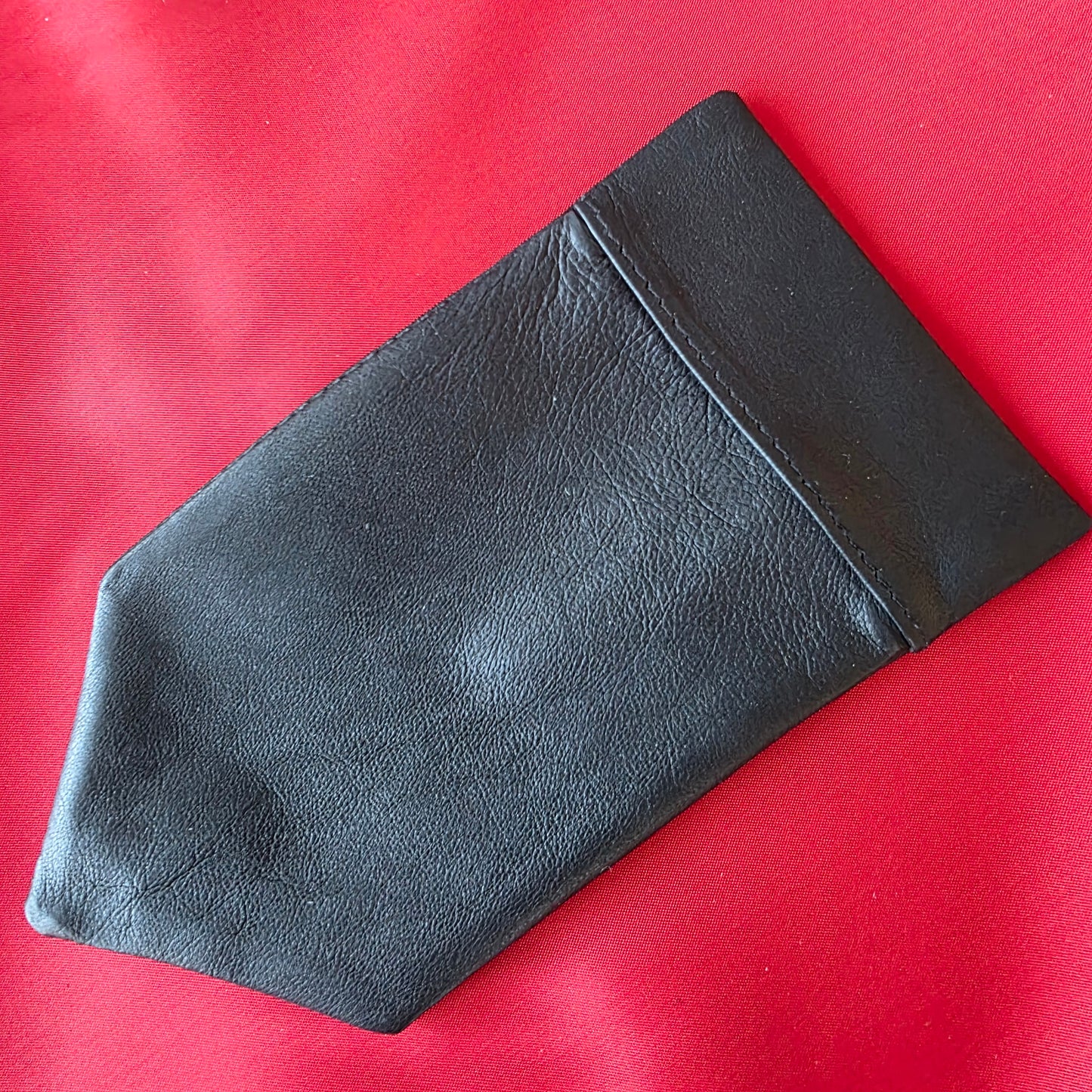 Detailed texture shot of Lux Tenebrae supple washable glove leather pocket square

