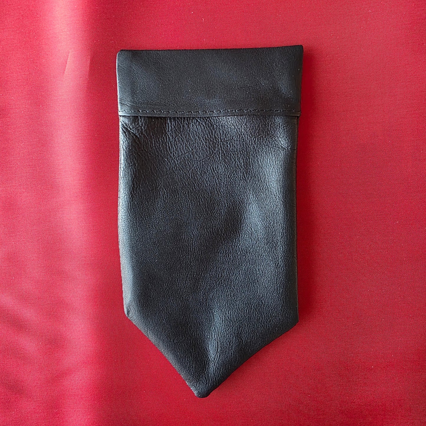 Lux Tenebrae black washable glove leather pocket square laid flat

