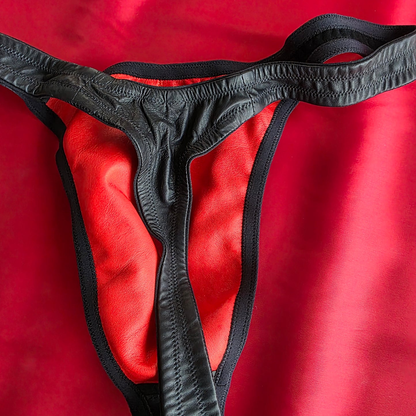 Men's Leather Lined Thong Size 34 Black with Red Lining