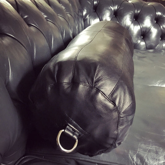 Washable black leather bolster cushion with steel D rings

