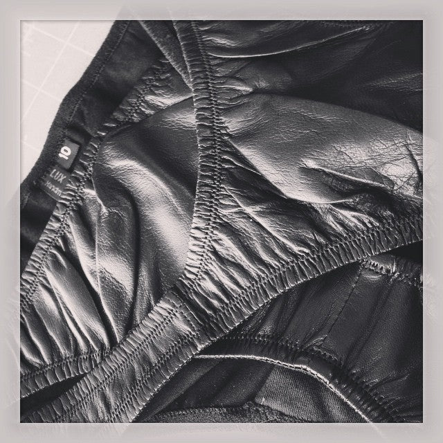 Leather hipster briefs for women in black, low-rise with elastic edging

