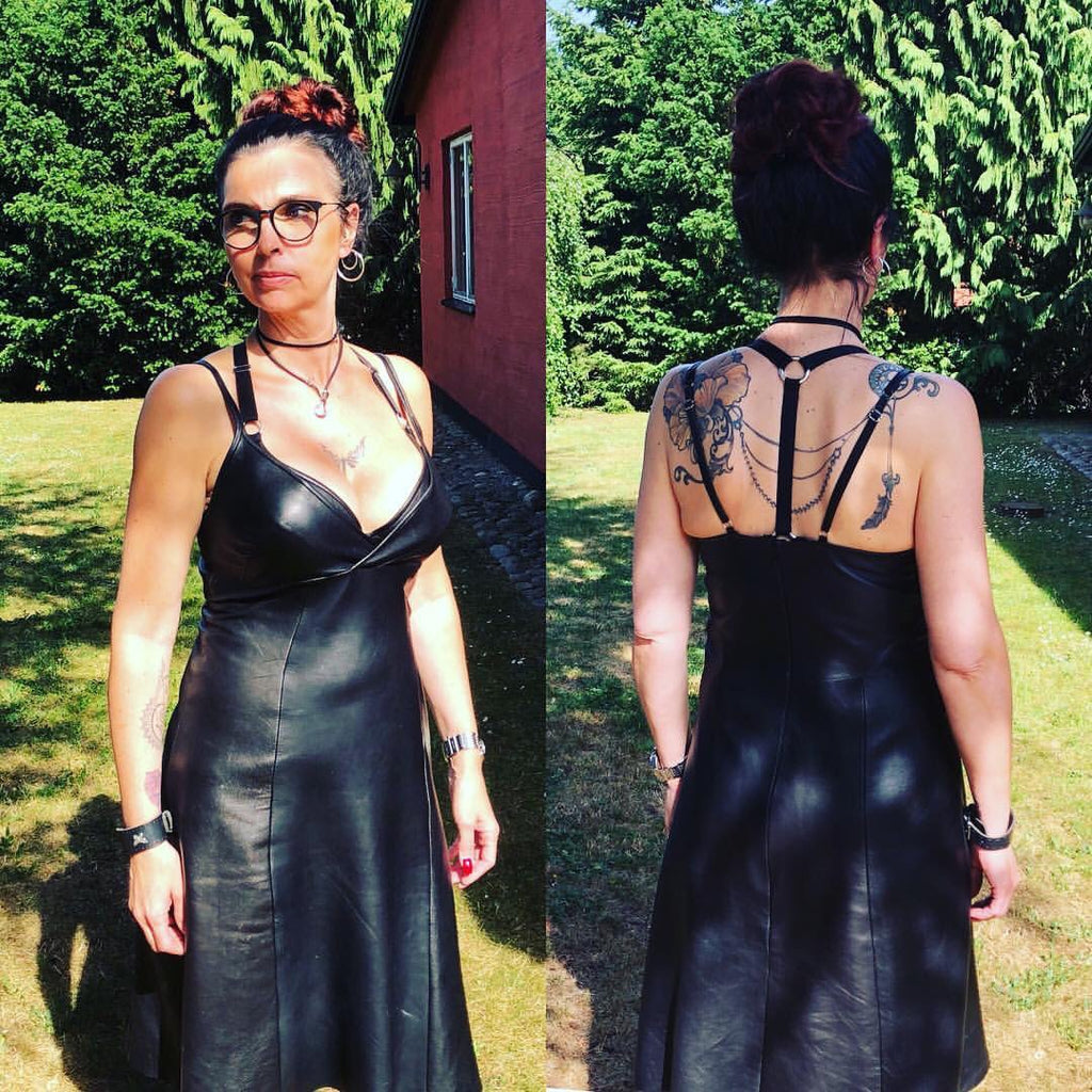 Black washable leather slip dress with adjustable straps, size UK 10, A-line leather slip dress in black—knee-length raw hem on clearance